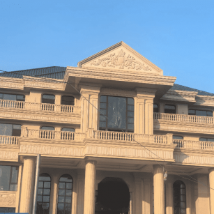 河源黄金麻别墅外墙干挂石材效果示例