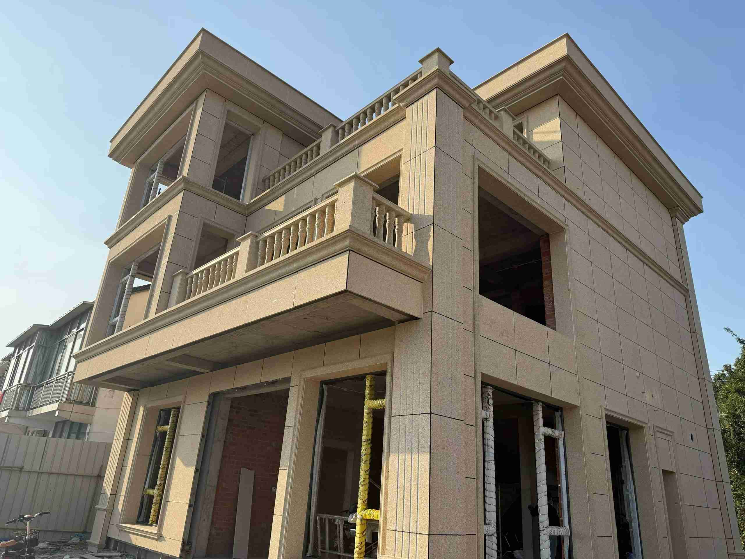 河源 黄金麻花岗岩石材荔枝面外墙干挂效果展示